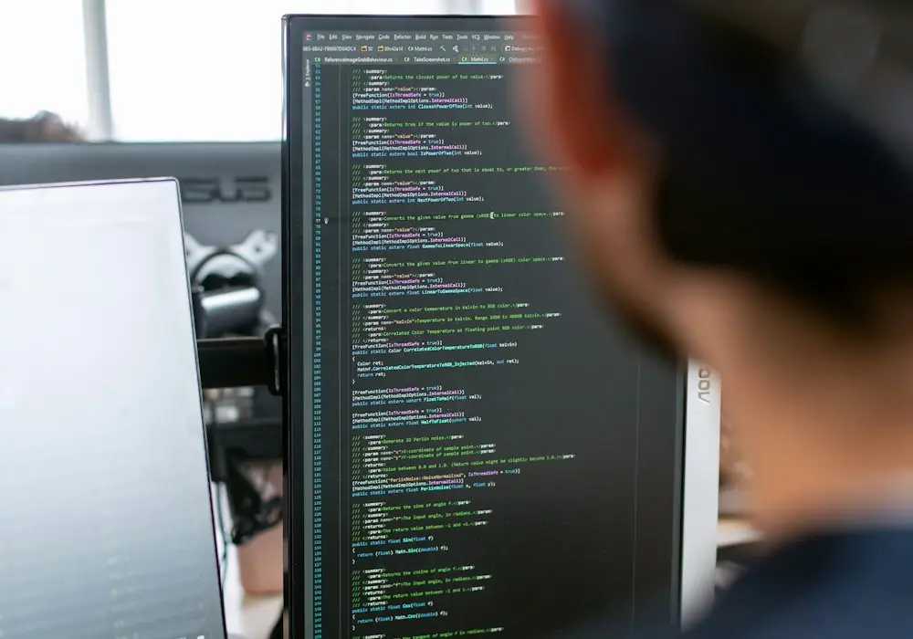 Field engineer reviewing data on a tablet at an industrial site